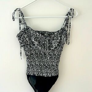 Free People spaghetti strap tie bodysuit- Excellent condition.